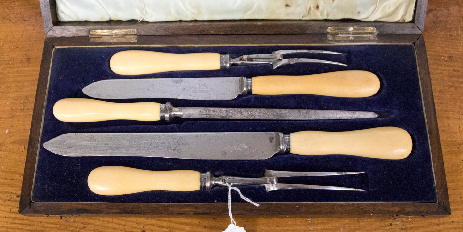 A late 19th century, early 20th century Walker & Hall, oak cased duo carving set with,