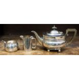 A married three piece silver tea service, sugar bowl, London 1910, approx 80gms/2.