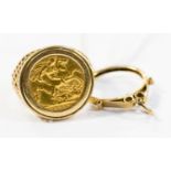 A 1910 Half Sovereign in 9ct gold ring mount, 10.