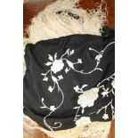 A black silk shawl,