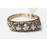 A five stone diamond boat ring, of graduated old-cut diamonds and rose-cut diamond chips,