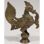Standard bronze India, 19th century Cock standing on a round plinth. His feathers finely cast.