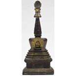 Stupa wood carved withe traces of gold Bhutan 18th century The multi stepped square plinth