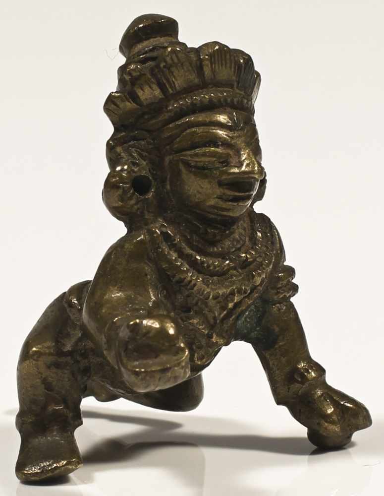 Baby Krishna bronze India 20th century Baby Krishna as "Butter Thief," holding the butter ball he