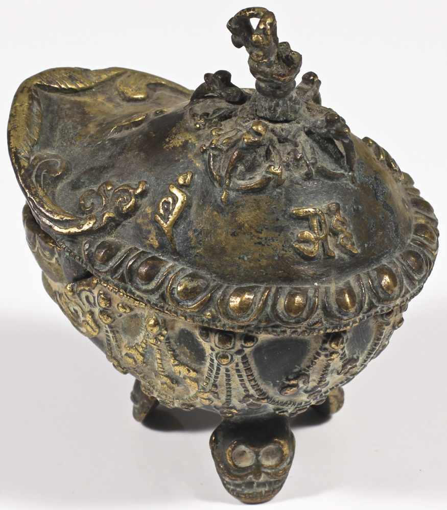 Kapalla brass Nepal 20th century Casted in two parts, the lower skull rests on three heads of - Image 2 of 2