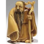 Bearded Sennin coloured ivory Japan, 20th century THIS LOT CONTAINS ANIMAL OR PLANT MATERIAL THAT