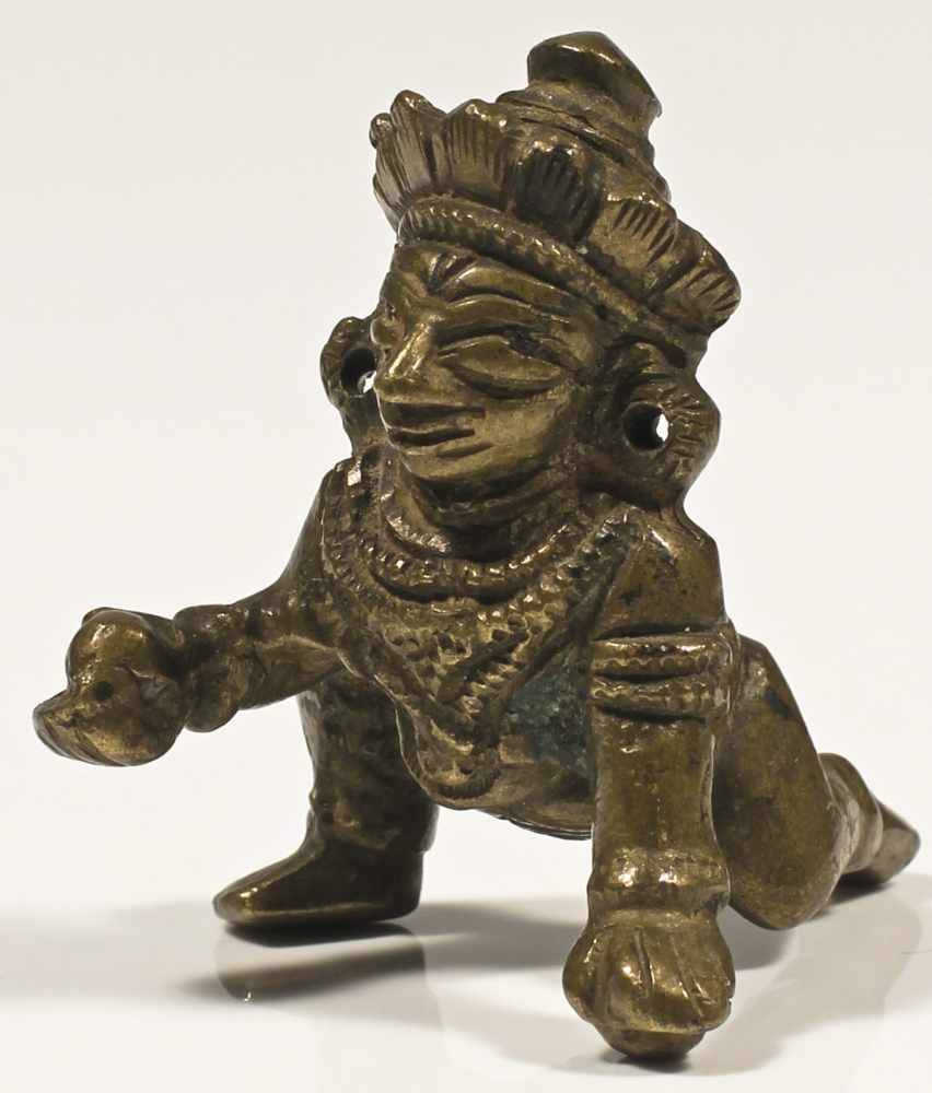 Baby Krishna bronze India 20th century Baby Krishna as "Butter Thief," holding the butter ball he - Image 2 of 2
