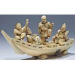 group celebrating on boat ivory Japan, 19th century four men celebrating on a boat. All smiling, a