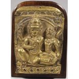 Uma Mahesvara copper repousse, fire gilt Nepal 18th century Shiva with 4 arms, holding a prayer