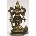 Vishnu bronze India 14th century Vishnu with 4 arms, standing on a turtle. His upper right holding