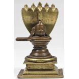 Shiva Lingam brass and copper bronze India 18th century Casted in three parts, the square base toped