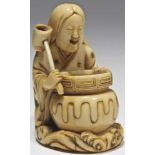 Woman with cooking pot ivory Japan, 19tth century Woman cooking, left hand holding a pot, the