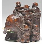 Okimono Netsuke ebony with ivory tooth, signed Japan, 2nd half 19th century 7 kids playing with an