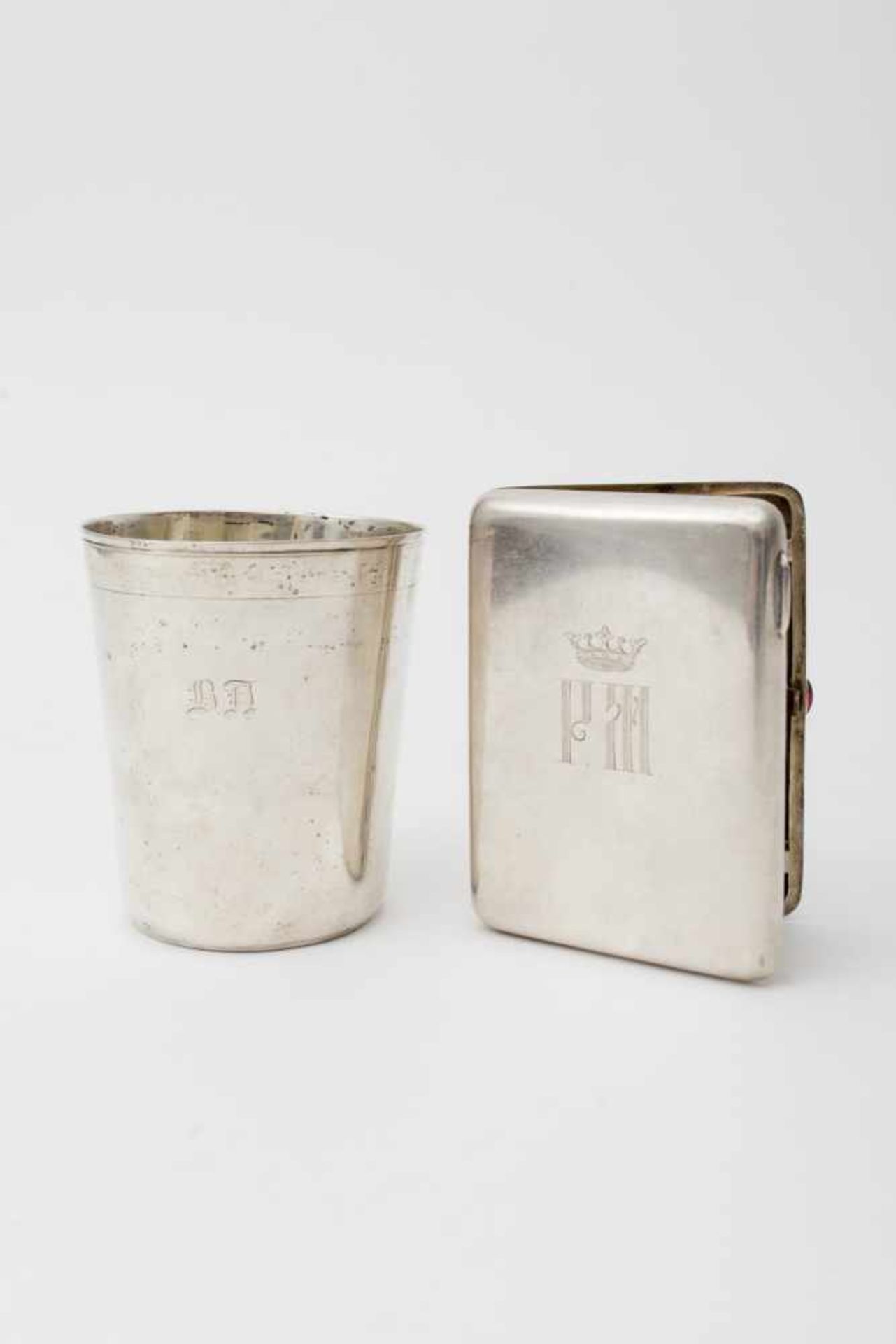 Russian lot Composed of a silver cigarette case engraved with initials, topped with a crown with