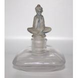French Lalique Style Scent Bottle, With Figural Blue Wash Stopper Depicting A Seated Arab Girl,