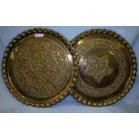 Large Decorative Brass Chargers Two in total of Middle Eastern design. Central foliate and star