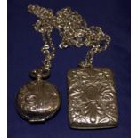 White Metal Vesta On Chain Together With A White Metal Sovereign Case On Chain