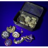 Small Tin Containing A Mixed Lot Of Pin Badges, Some Enamel/Silver, Watch Keys And Miniature Bone