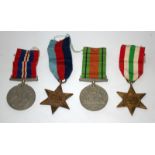 Military Interest, Set Of 4 WWII Medals Comprising The Defence Medal, The 1939-1945 Medal, The Italy