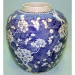A LARGE ANTIQUE CHINESE GINGER JAR decorated with flowering cherry blossom, four character marks