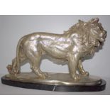 Large 20thC Silvered Bronze Sculpture Depicting A Majestic Standing Lion, Mounted On A Black Marble