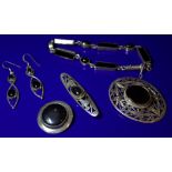 Collection Of Silver And Black Stone Jewellery Comprising A Bracelet, 3 Brooches And A Pair Of
