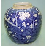 A LARGE ANTIQUE CHINESE GINGER JAR decorated with flowering cherry blossoms to the body and double
