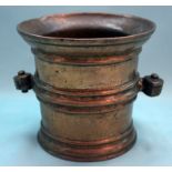 16/17thC Bronze Mortar, Ribbed body And Gripped Hand Side Handles Height 16cm