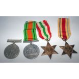 Military Interest, Set Of 4 WWII Medals Comprising The Defence Medal, The 1939-1945 Medal, The Italy