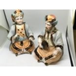 2 Circa 1900 Bisque Porcelain Bobbing / Nodding Head Figures. Father and son dressed in Middle