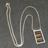 Vintage Italian Silver Necklace With Abacus Pendant. Alternating rows of Red & Clear Glass Beads.