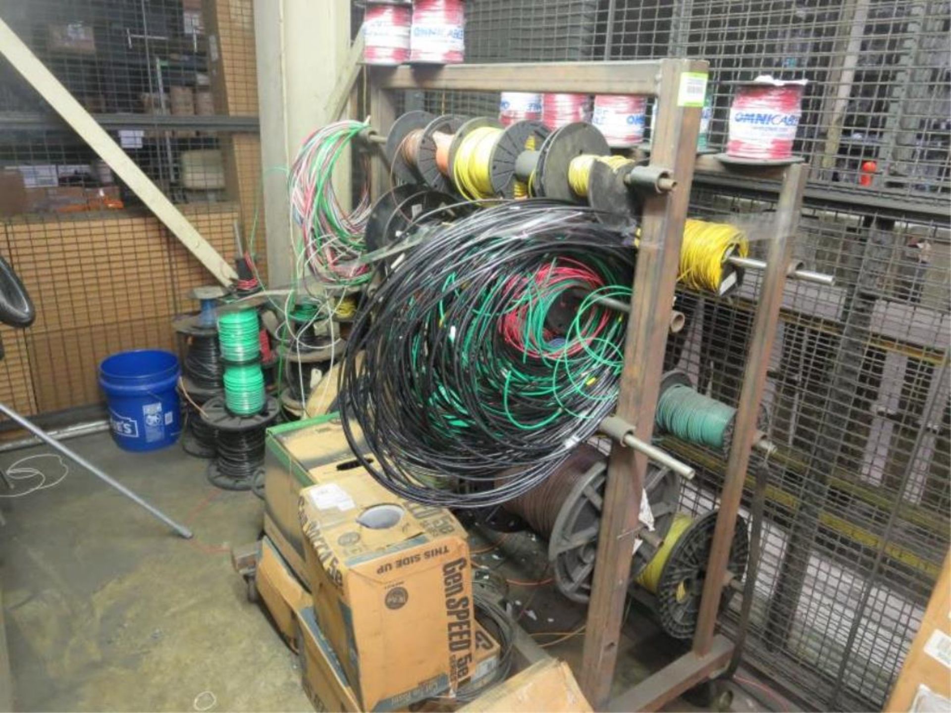 Electrical Wire. Rack, with contents & wire on floor next to Rack. Hit # 2203002. Bldg.1 Elect.