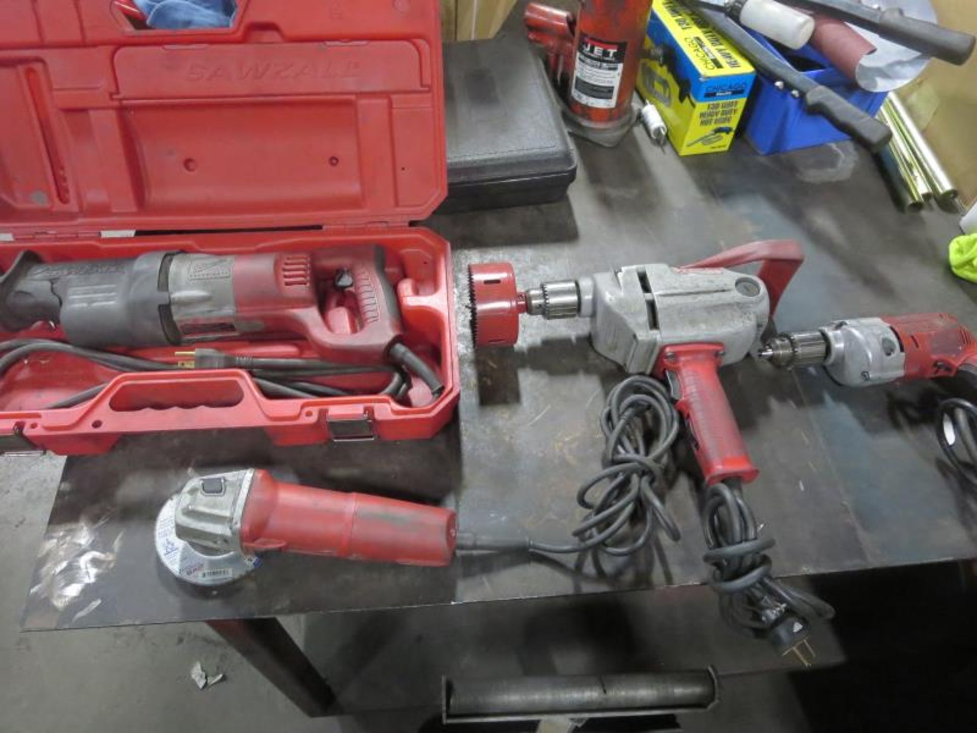Milwaukee Lot (Qty 4) Drill, Saw & Grinder. Consisting of (1) Reciprocating saw, (1) 4" Grinder, (2)