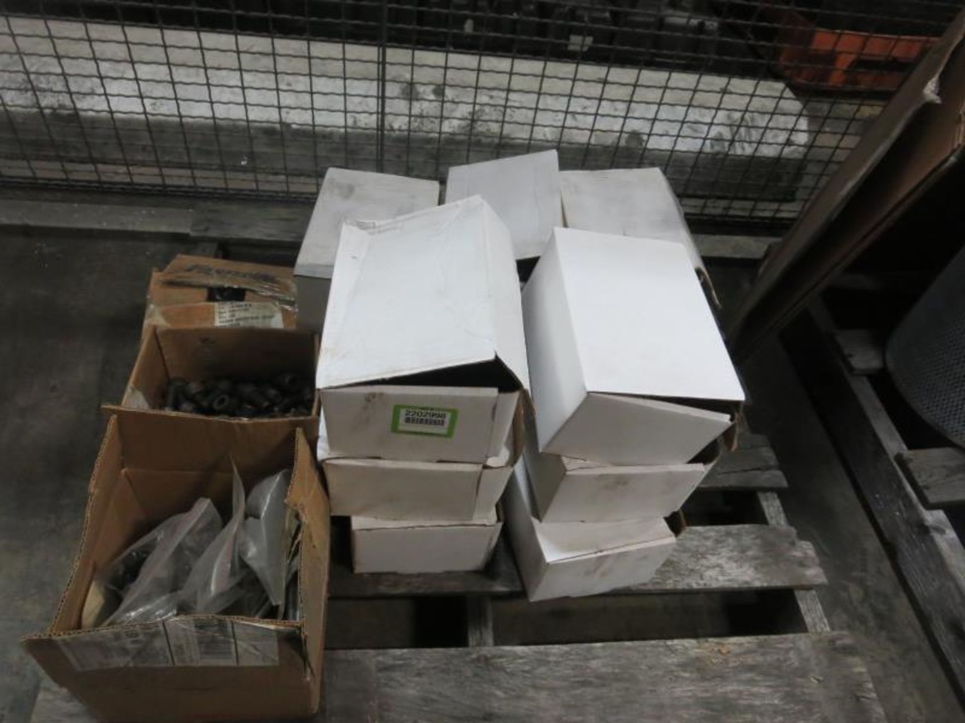 Lot 1 Skid, with 15 boxes of Nuts & Bolts. Hit # 2202998. Bldg.1 Cage. Asset Located at 820 S Post