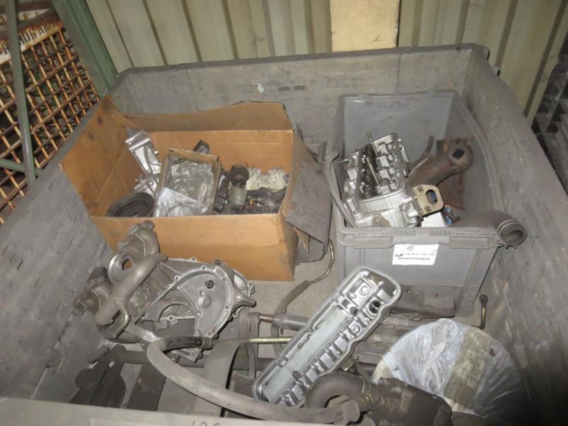 Nissan Forklift Parts. Lot (2) Totes, Engine parts, Seat, assorted plastic. Hit # 2202951. Bldg.1. - Image 2 of 2
