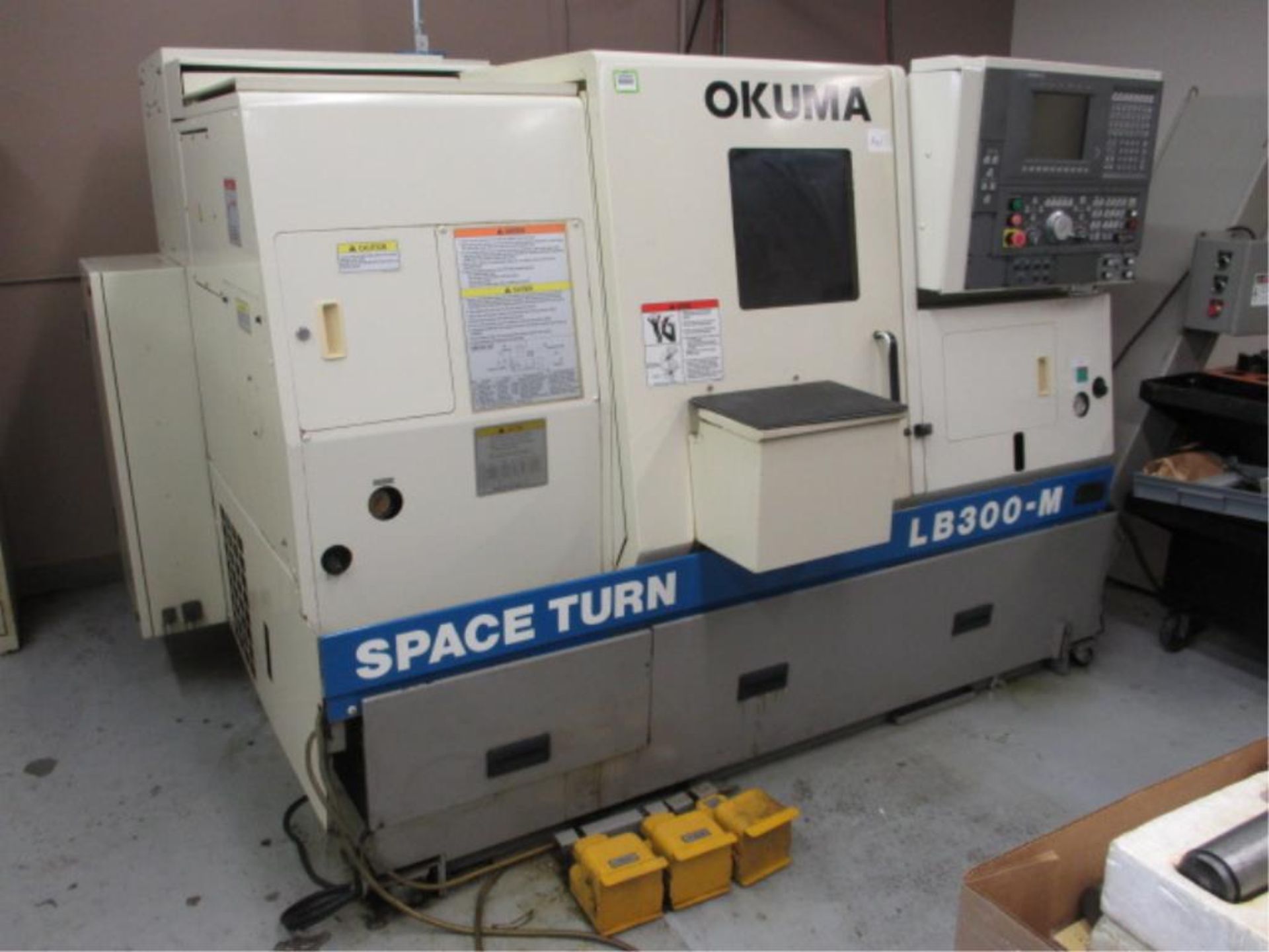 Turning Center. 1998 Okuma Space Turn LB300-M 3-Axis CNC Turning Center with Live Tool Turret, 8.25"