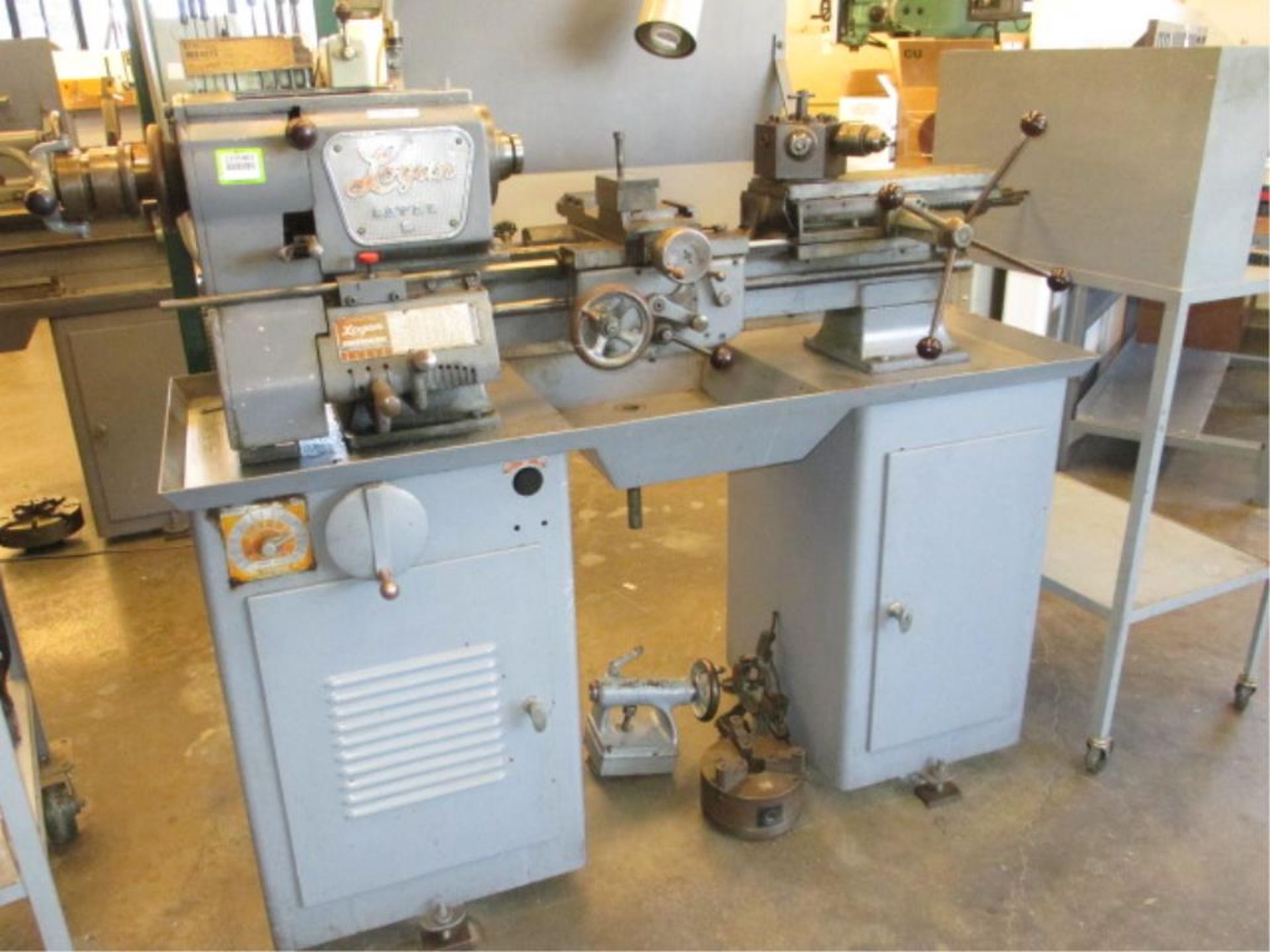 Lathe. Logan 2535.2.VH Variable Speed Engine Lathe with 7.5" 3-Jaw Chuck, 1 1/16" Spindle Bore,