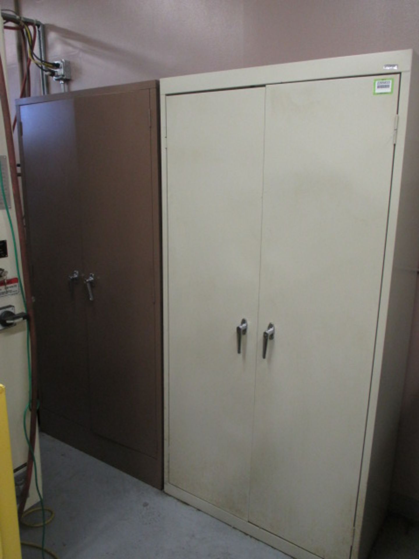 Cabinets with Contents. Lot: (2) Storage Cabinets with Chuck Jaws and More. HIT# 2205833. CNC