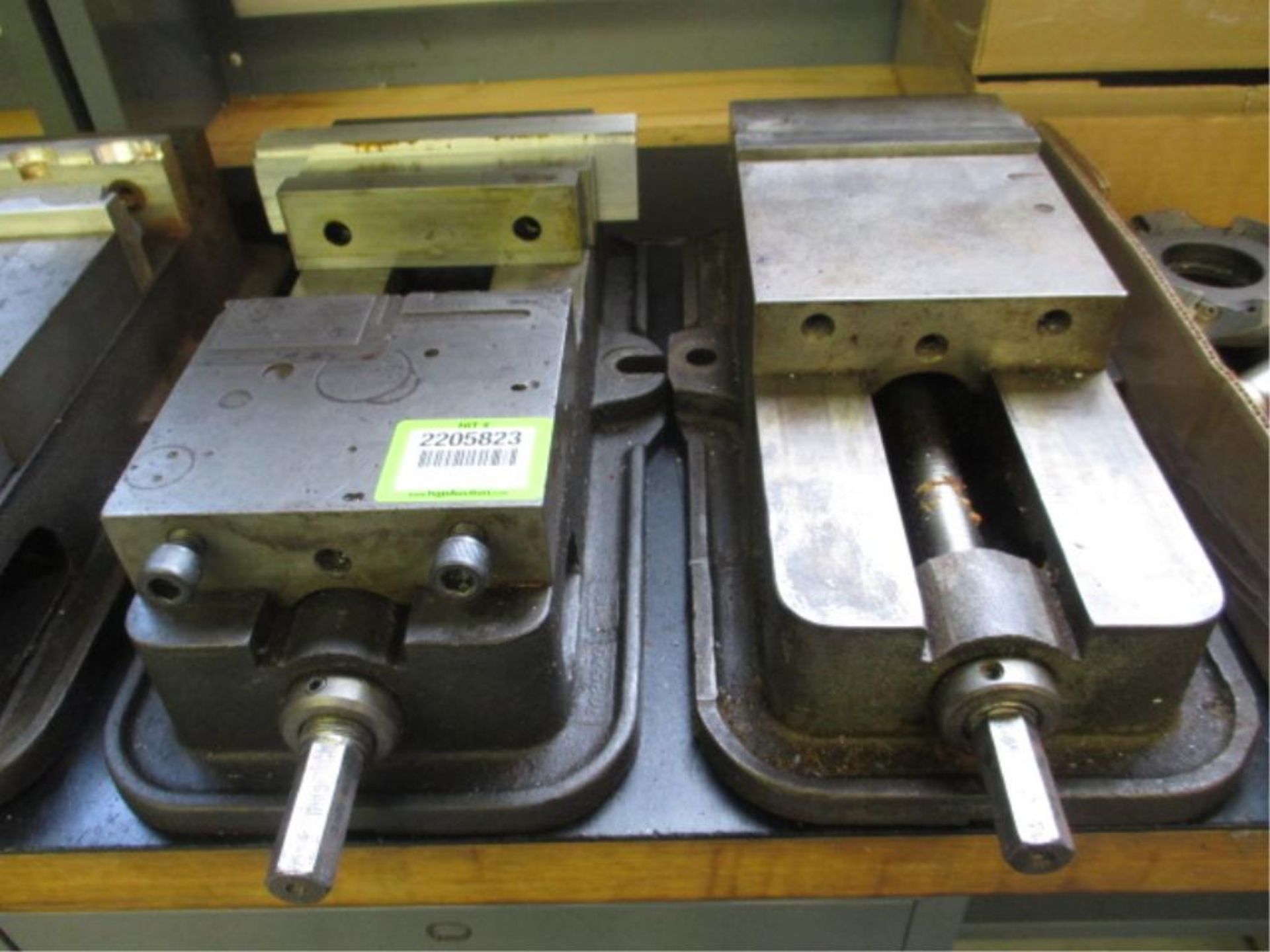 Vises. Kurt Lot: (2) 6" Angle-Lock Vises. HIT# 2205823. CNC Room. Asset Located at 859 Ward Drive,