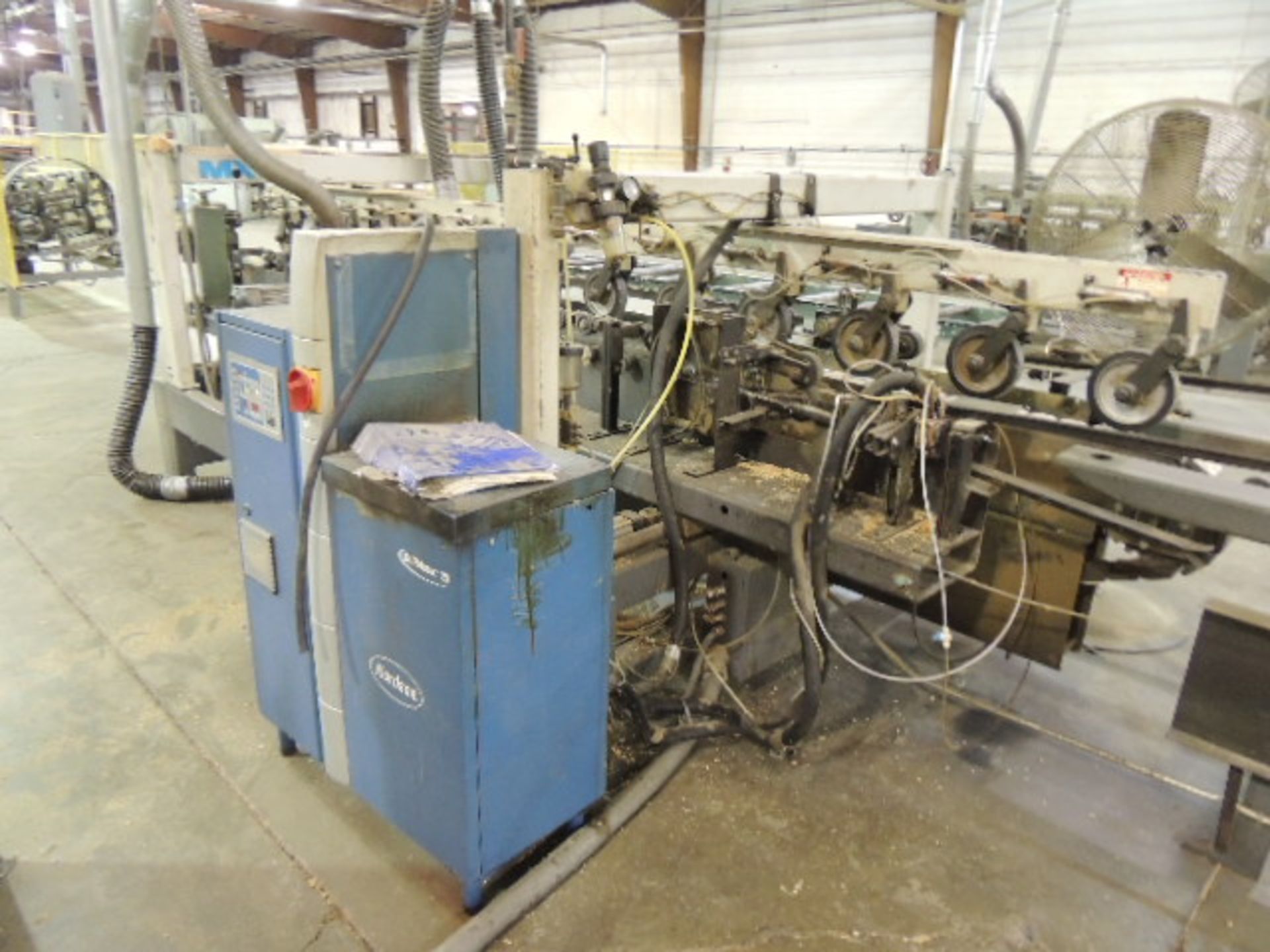 Midwest Automation CF 1520 Core fab 25" and 28" pneumatic width adjustment, has Nordson DuraBlue