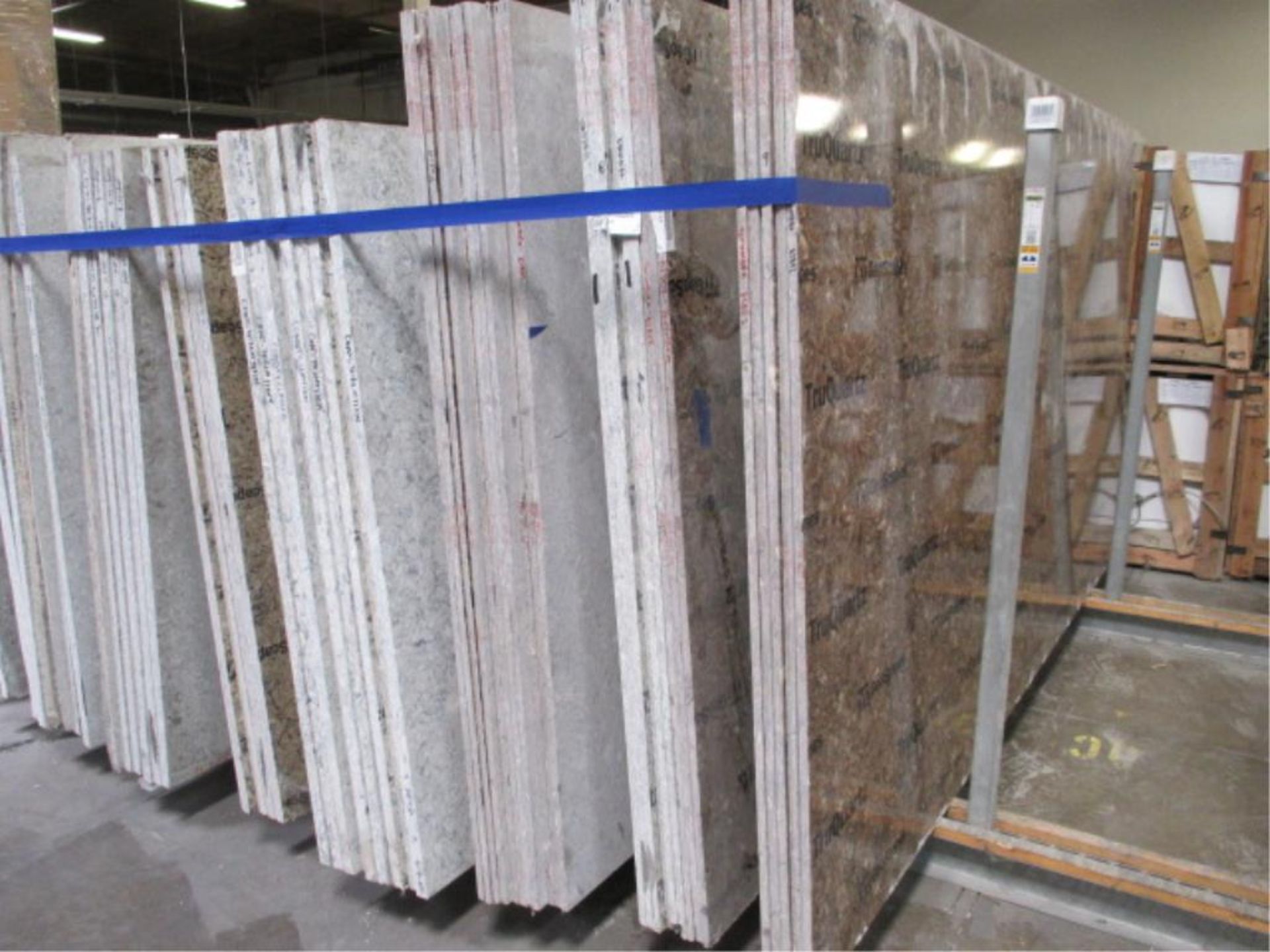 Lot: (52) Assorted Quartz Stone Slabs with (4) Wood A-Frames [click on PDF Hyperlink Located in