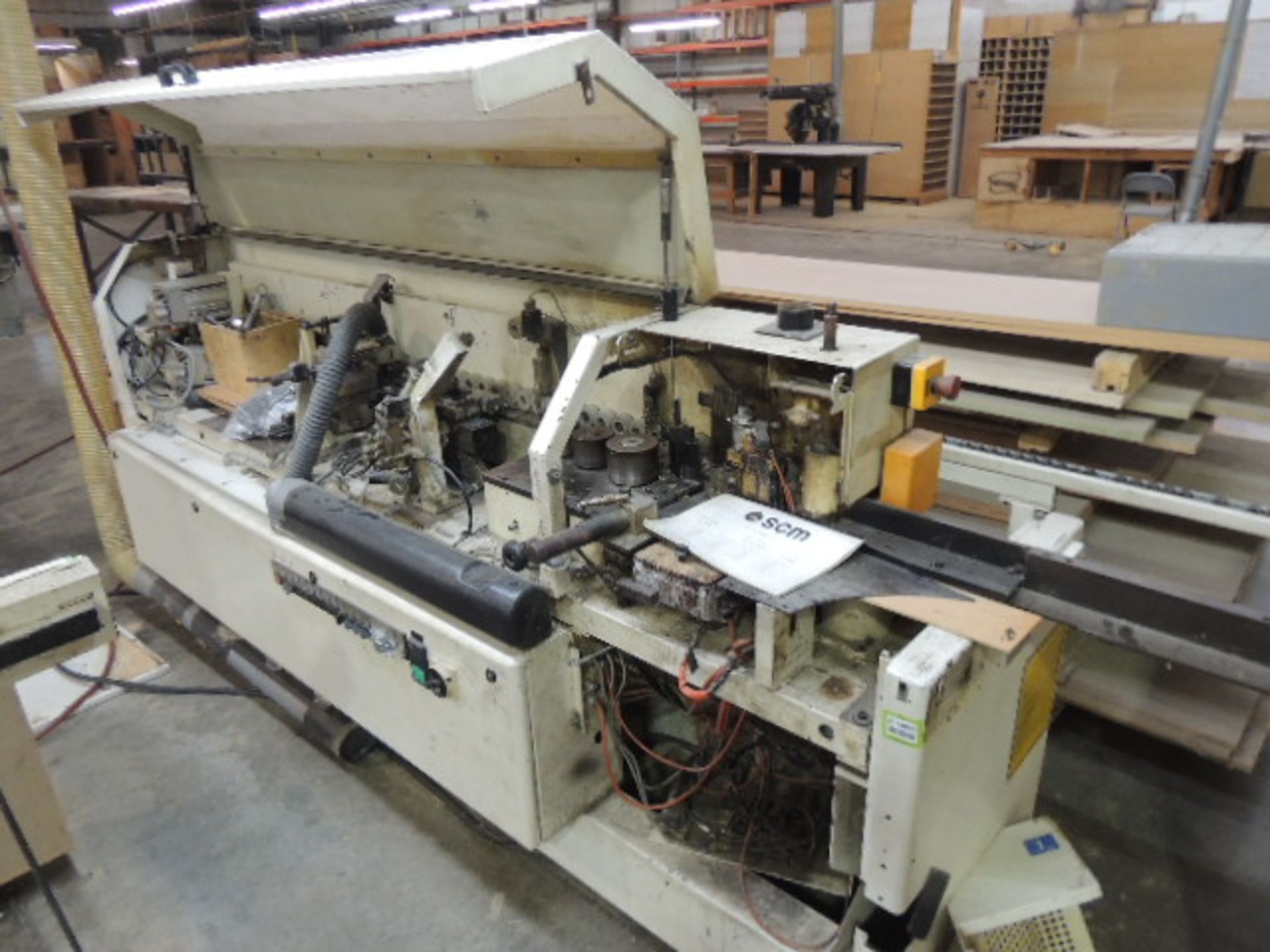 SCMI K203EX Edge Bander, 12" bar, 230v. SN# AHM03452. HIT# 2158089. Accessories Area.. Asset Located