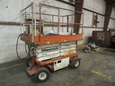 Hunter Electric scissor lift 21' height, internal charger 115v. SN# FE 9309. HIT# 2158105.