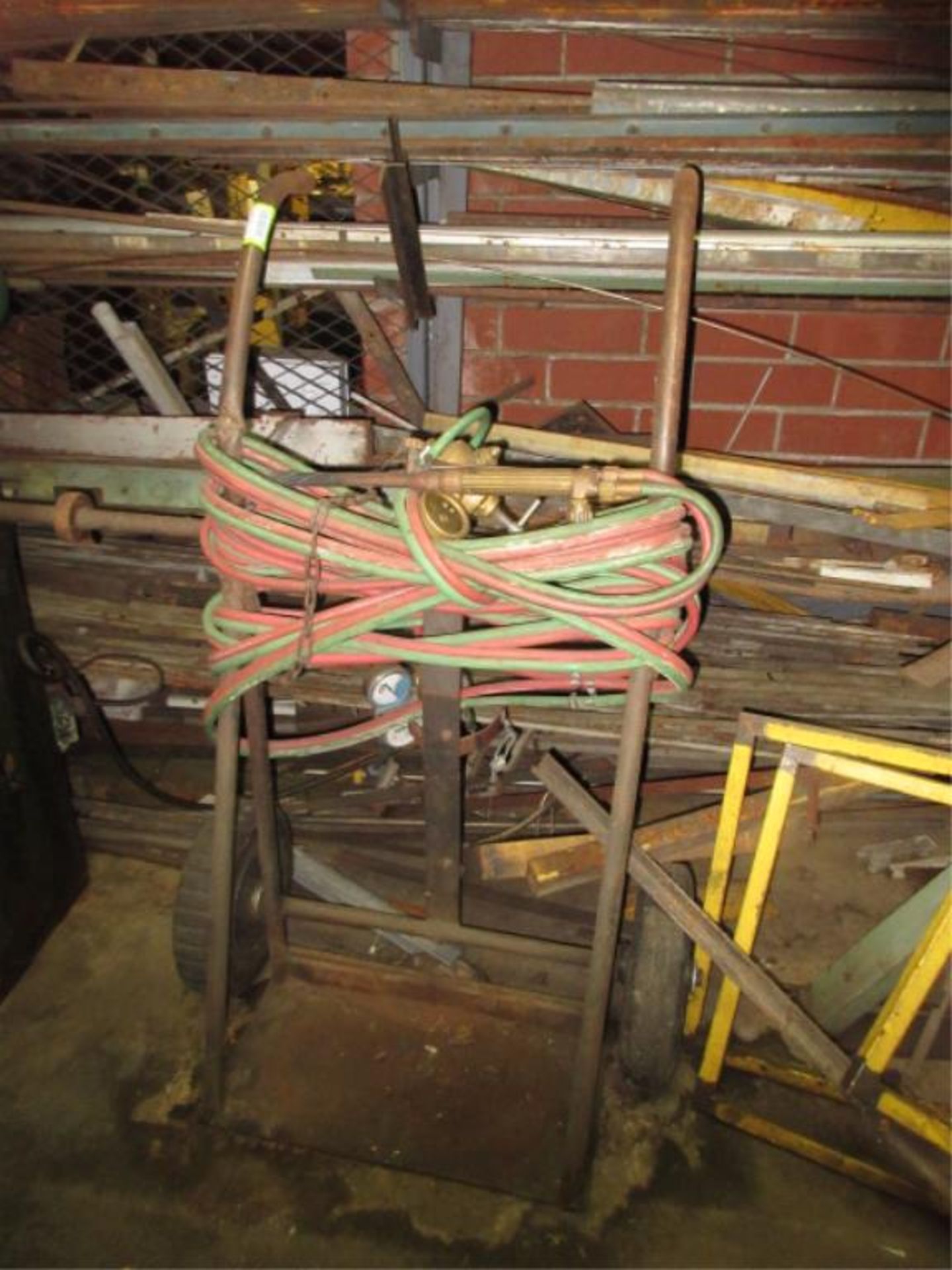 Torch Outfit, includes: torch, regulator, hose & cart. HIT# 2179345. basement weld shop. Asset