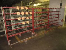 Lot of (3) Pin Trucks, 57"L x 30"W x 65"H, color red. HIT# 2179410. texture area. Asset Located at