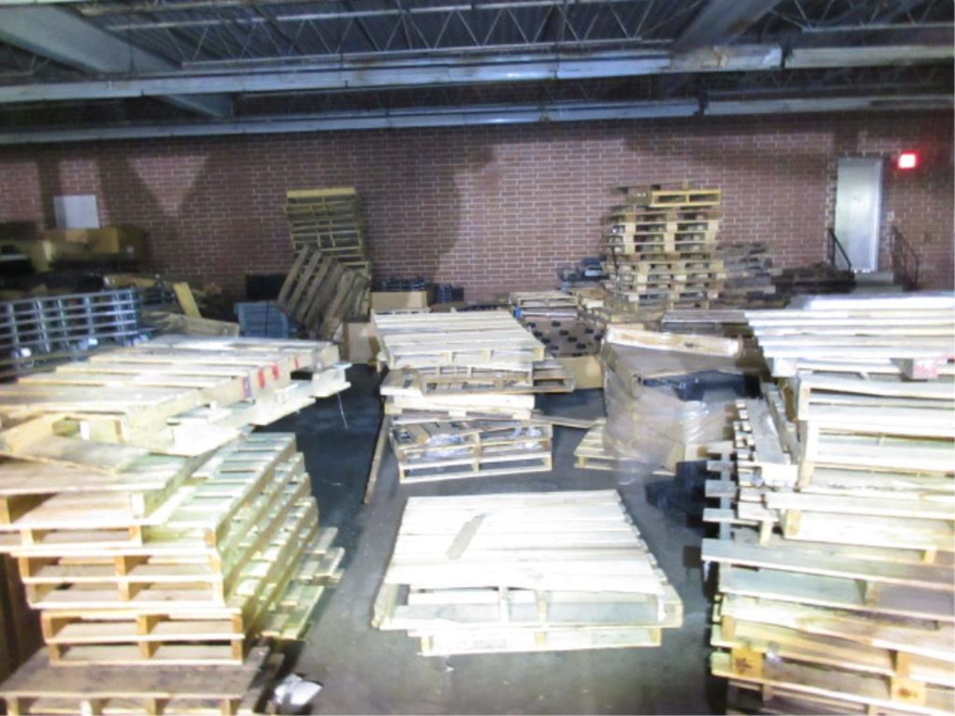 Lot Empty Wood Pallets, includes a handful of plastic units, all in upper warehouse. HIT# 2179457. - Image 4 of 7