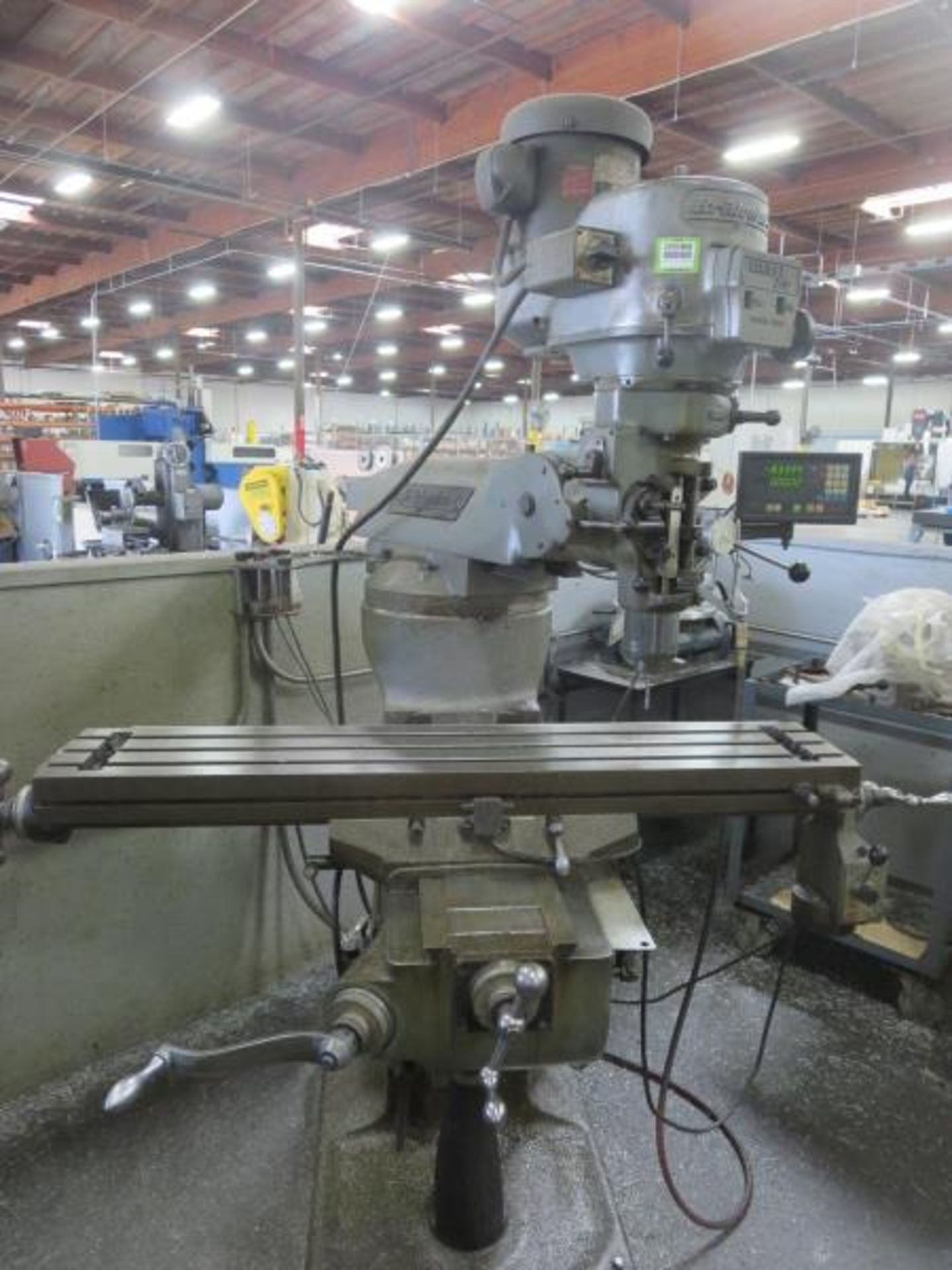 Bridgeport Series 1 Vertical Mill, 2 HP, 9" x 48" bed, 3 axis, 40° tilting head, Newall Digital