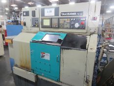 Takisawa TC-20 CNC Lathe. 16.5" Swing x 12" Length, 12- Station Turret automatic Tool Changer,