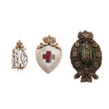 BADGE of the Russian Red Cross Society. silver, vermeil and enamel mounted on pin [...]