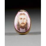 A PORCELAIN EASTER EGG SHOWING THE MANDYLION Russian, 19th century The backside gilded. Wearings.